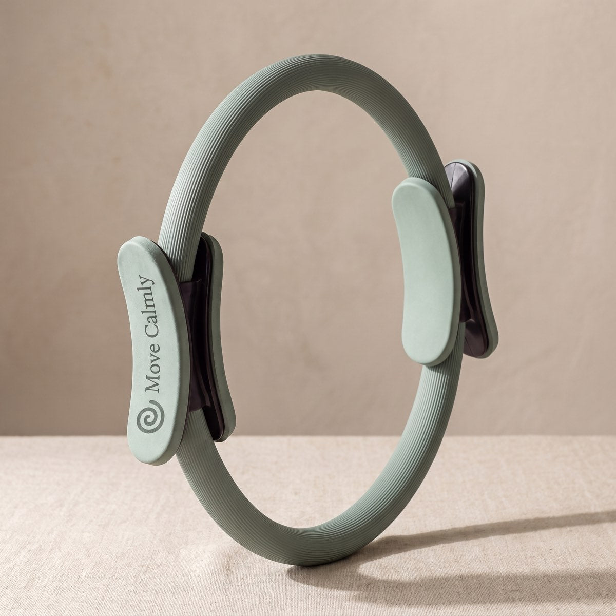 Move Calmly sage Pilates ring with two padded grips
