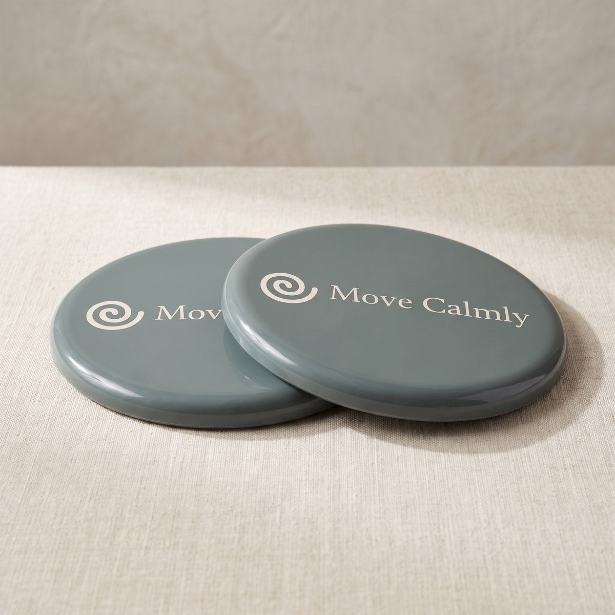 Move Calmly pair of slate green slider discs